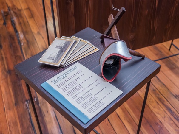 stereoscope with stack of historic Abilene stereo cards