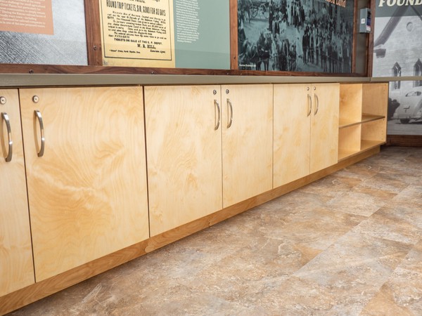 row of handsome light wood tone cabinets